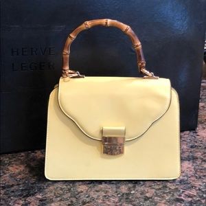 Wooden Handel yellow handbag
